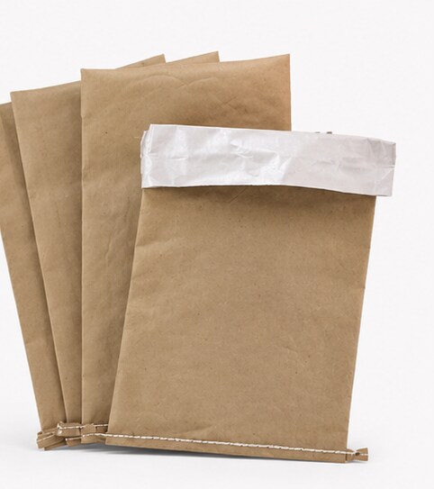 Multi-layer paper bags stacked with open tops